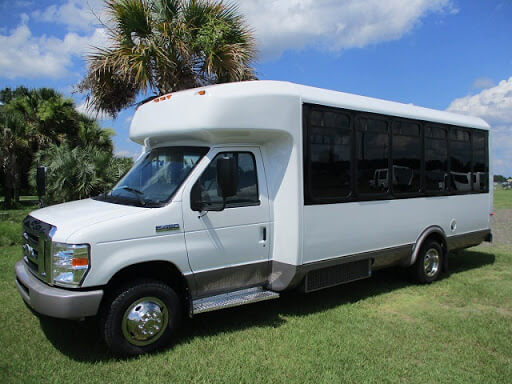 aerotech coach transit bus with palms in background
